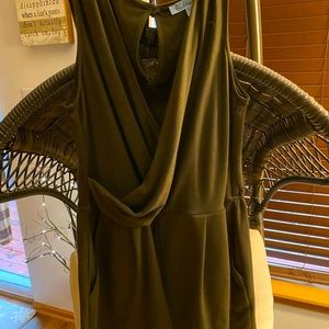 Sleeveless Romper with pockets. Looks khaki but really black. At least to my eye